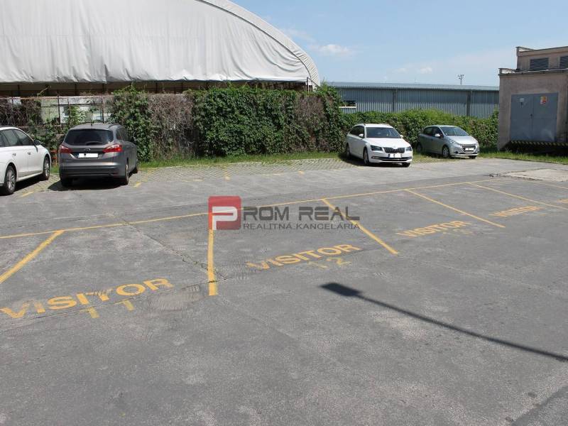 Visitor parking on Púchovská Street in Bratislava III near the warehouse halls.