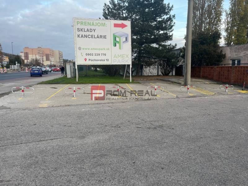 Parking space with office rental advertisement on Púchovská Street in Bratislava III.