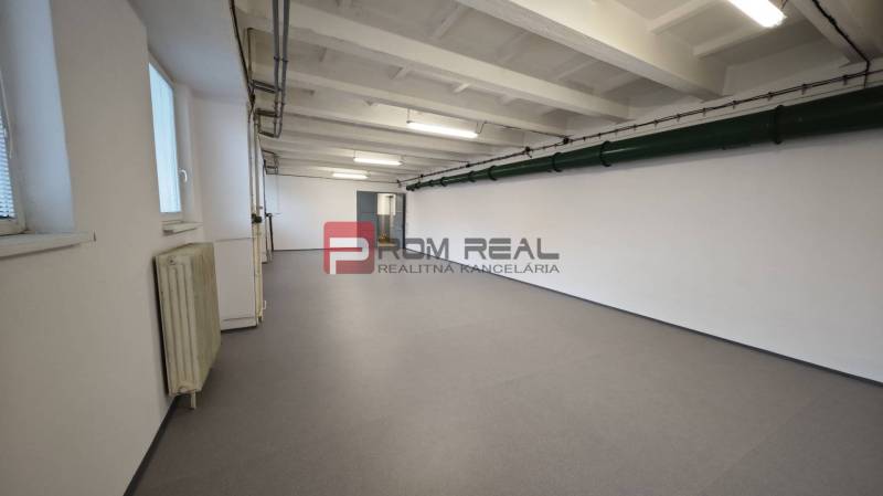 Spacious interior, white walls, high ceiling, LED lighting, warehouses and halls.