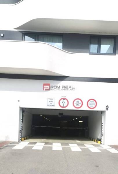 Entrance to the garages on Údernícka Street in Bratislava V, with prohibition signs.