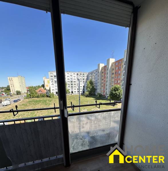 View from a one-room apartment on General Klapka Street in Komárno with panel buildings.