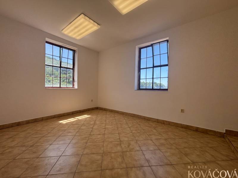 Interior of warehouses and halls with windows and ceramic tiles on the floor.