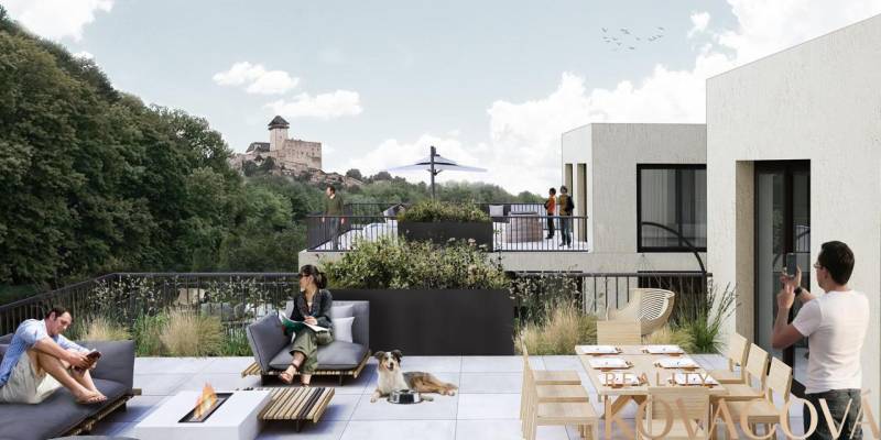 Rooftop terrace with a view of the castle in Trenčín; construction of apartments on M.R. Štefánik Street.