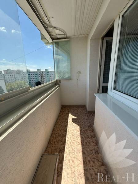 Glazed loggia of a 2-room apartment on Bučinova Street in Bratislava-Vrakuňa.
