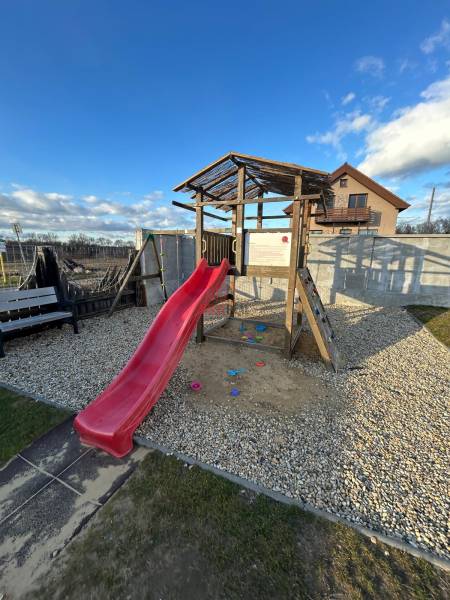 Wooden slide at the children's playground in Devínska Nová Ves, Devínske jazero.