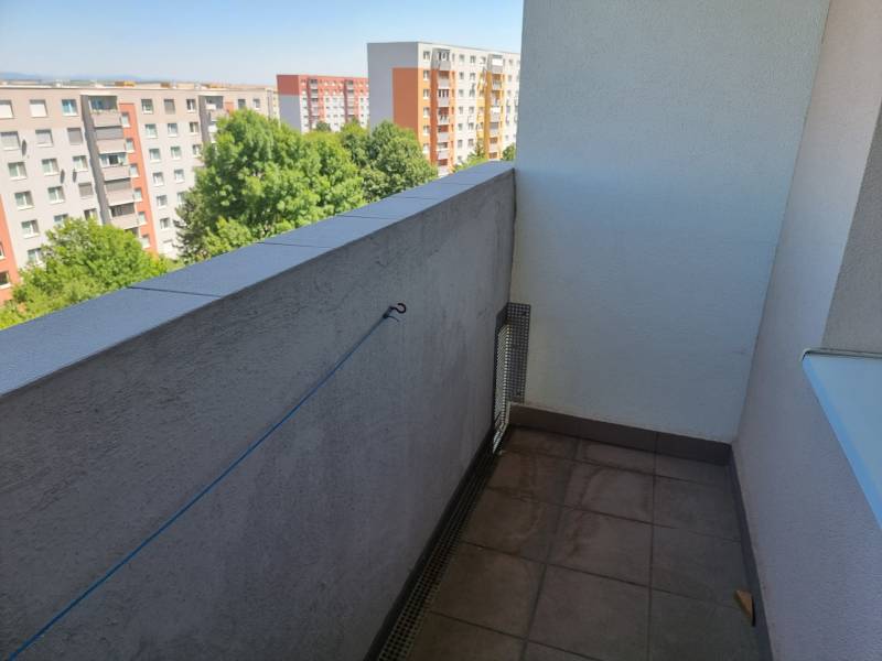 A balcony with a view of the apartment blocks on Petzwalova Street in Nitra, at a 2-room apartment.