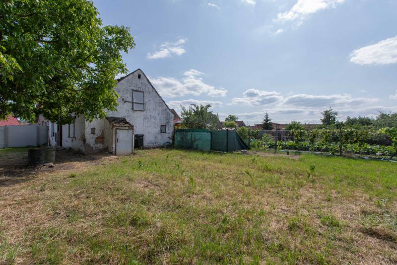 Traditional house and garden on Športová Street in Gajary, suitable for residential plots.