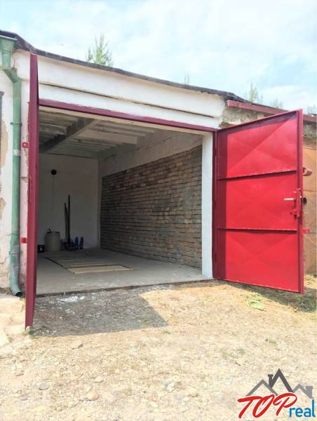 Open garage on Michalovská Street in Košice - Západ district.