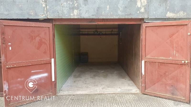 Open garage door on Dudvážska Street in Bratislava - Podunajské Biskupice, view inside.