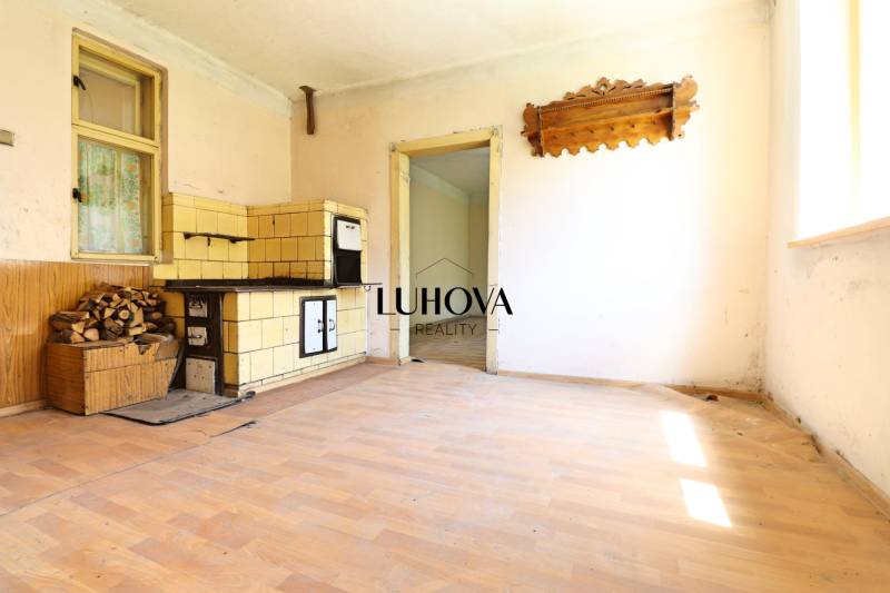 An old wood stove in the interior of a family house.