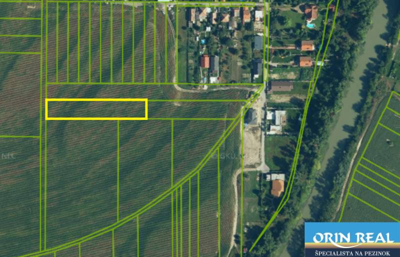 Aerial photograph of agricultural and forest land in the village of Zálesie, Domky Street.