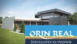 A family house at the Sunny Lakes in Senec next to the real estate agency signs.