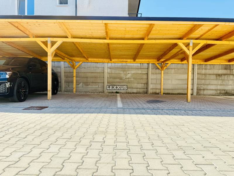 Covered parking space on Geologická Street in Bratislava - Podunajské Biskupice.