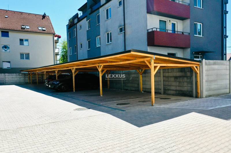 Covered parking lot near the apartment building on Geologická Street in Bratislava - Podunajské Biskupice.