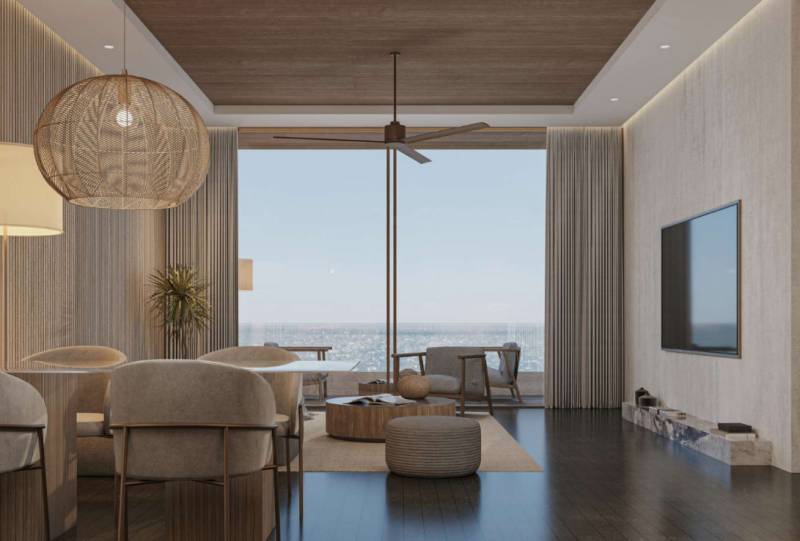 Luxurious interior of a family house with a view through large windows of the city.