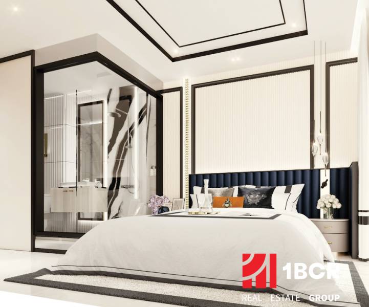 A bedroom in a 3-room apartment with a large bed and a glass-walled bathroom.