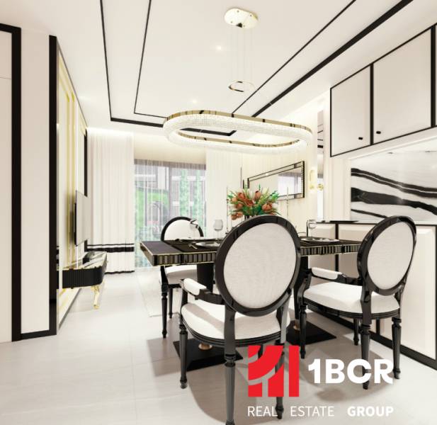 Luxurious dining room in a 3-room apartment, elegant table and chairs with modern lighting.