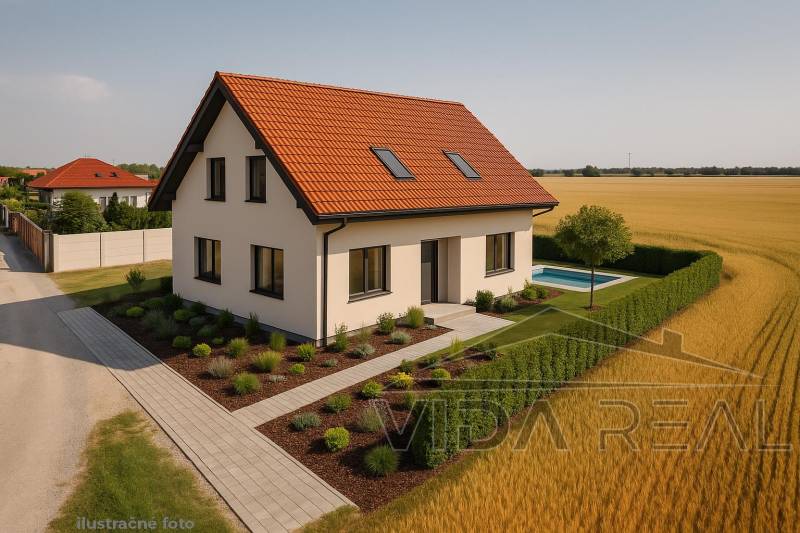 A family house with a red roof and a garden in Pozemky - bývanie, Dunajská Lužná.