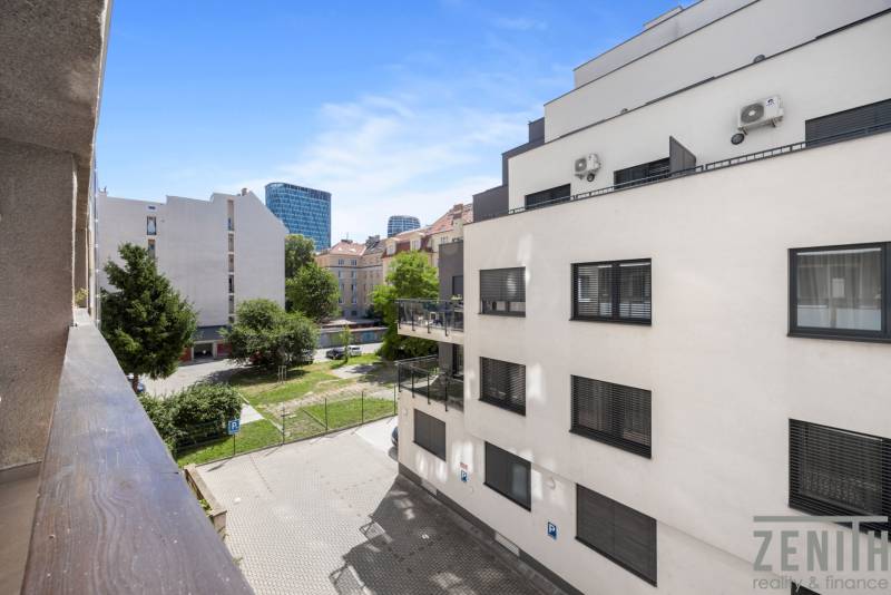 View from a 3-room apartment of buildings and a parking lot in Bratislava - Old Town.