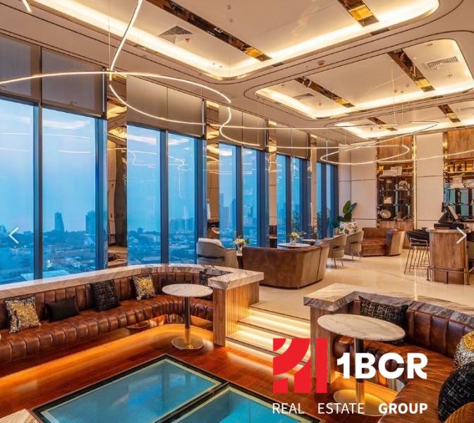 Luxury interior of apartment development with panoramic city views.