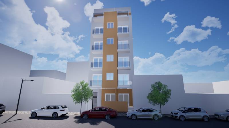 A six-story apartment building on Campoamor 12 street in Torrevieja with parked cars.