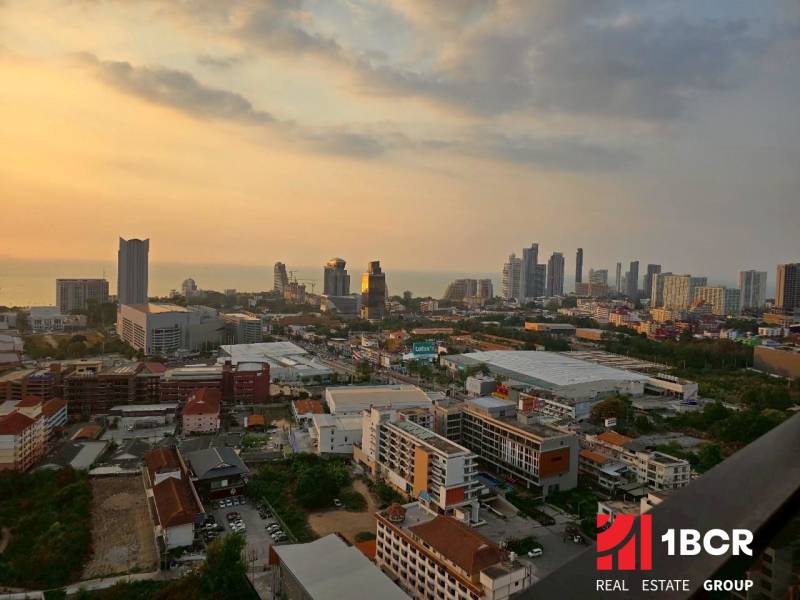 Sunset view over the city skyline from a 3-bedroom apartment in Pattaya.