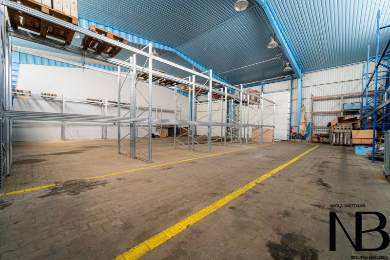 Empty shelves and storage spaces in manufacturing facilities.