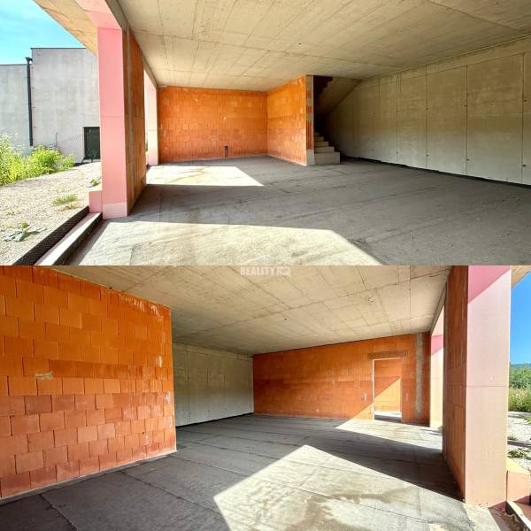 Basement spaces in a family house in Trnové, Žilina with raw walls and a concrete ceiling.