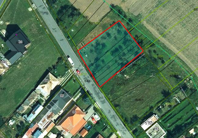Aerial view of Land - commercial in Kamenné Kosihy, outlined in red.