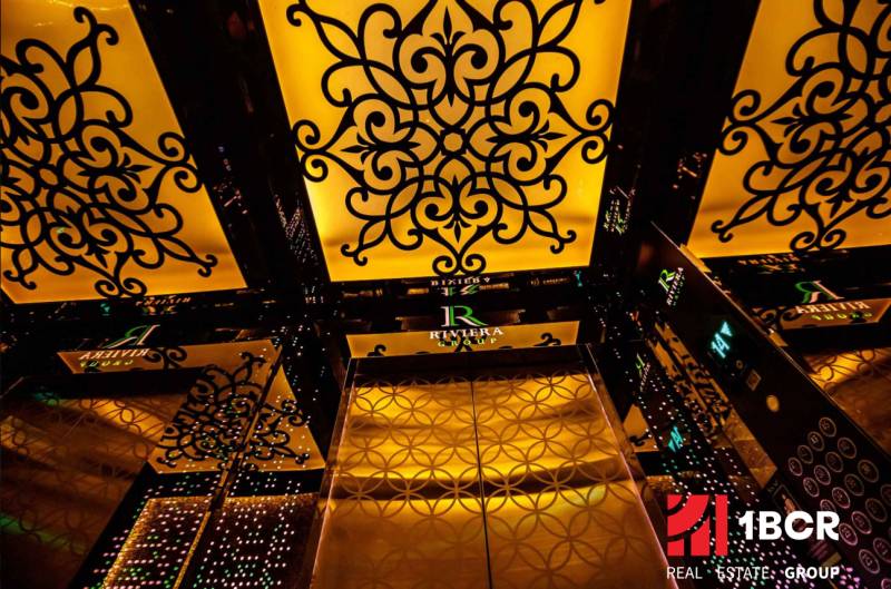 Interior of an elevator with ornamental decoration in residential construction.