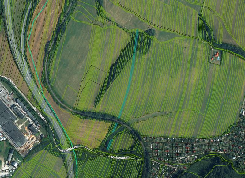Aerial view of agricultural and forest lands around Prievidza.