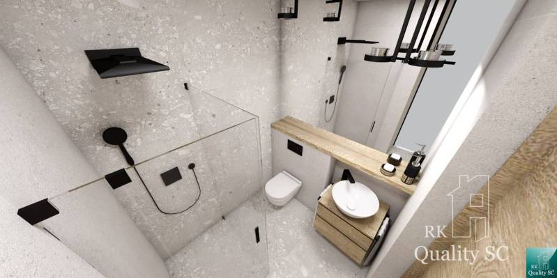 A minimalist bathroom in a family house with black elements and a wooden shelf.