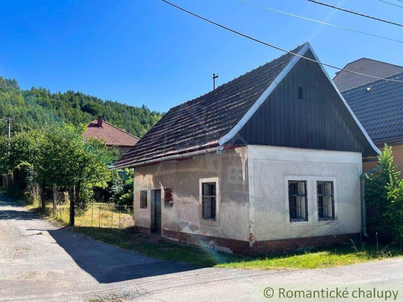 A family house in Banská Bystrica with traditional architecture on the edge of the forest.