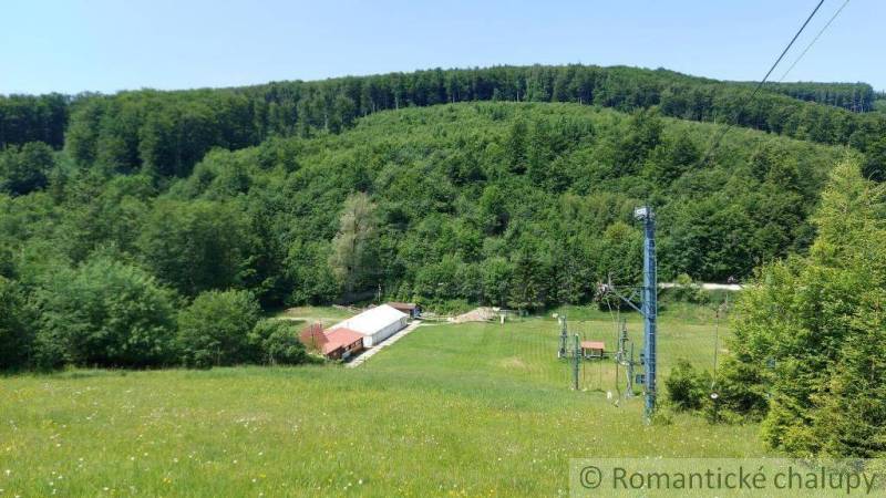Snow-covered greenery and a ski lift in a beautiful setting near Stará Myjava.