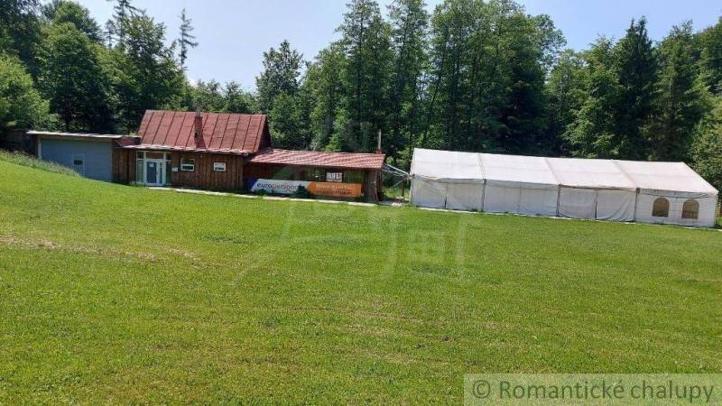 Commercial premises in Stara Myjava with a stall and a large tent on a green meadow.