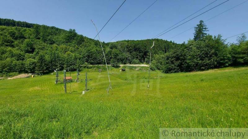 Green hills and a ski lift surround the commercial premises in Stará Myjava.