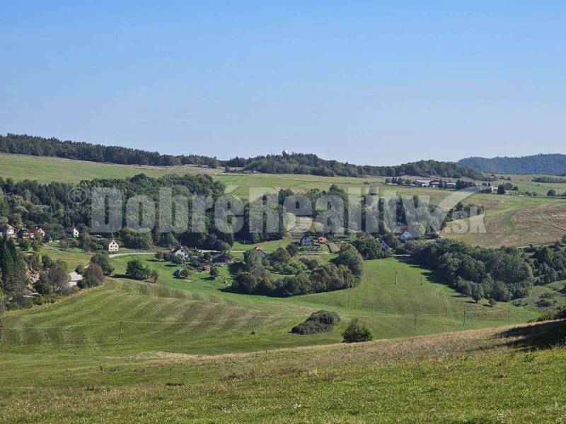 A view of family houses in the beautiful green landscape of Malá Lehota.