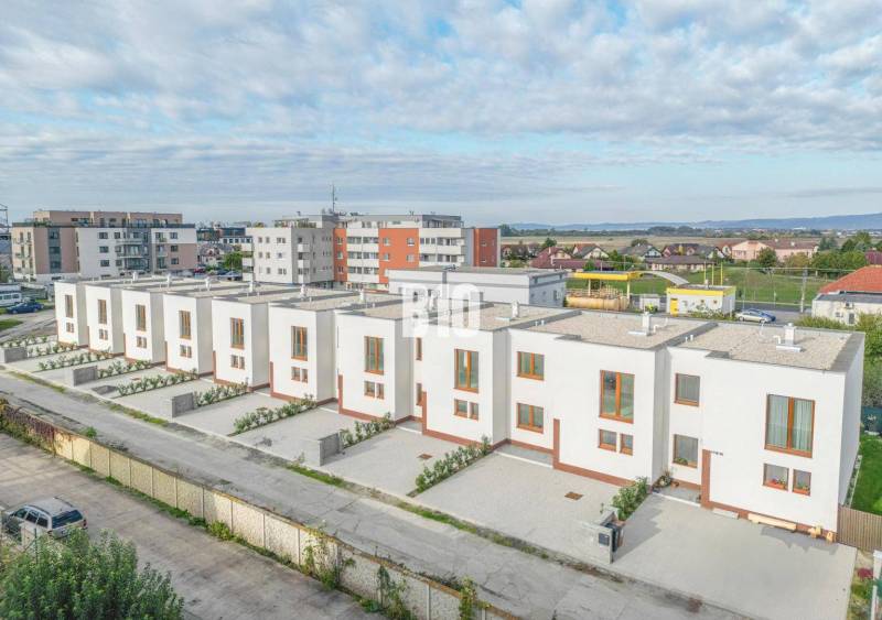 Row family houses on Nová Dedinka Street - Nová Ves pri Dunaji with the surrounding area of the housing estate.