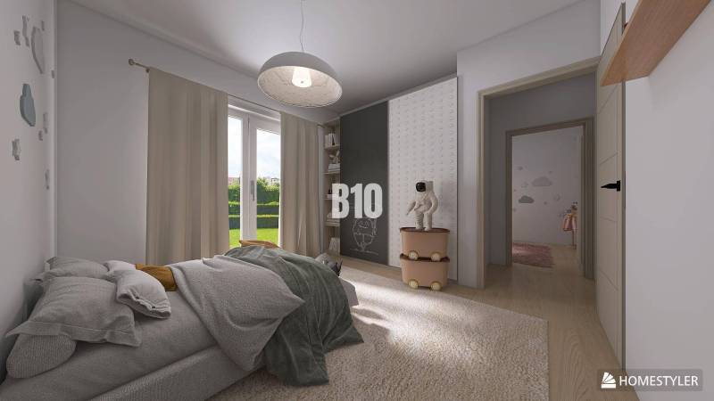Children's room with a bed, decorations, and access to the garden in a family house.