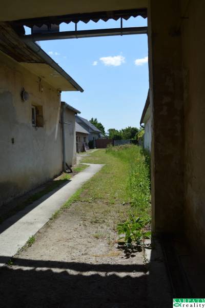 Exterior of commercial premises in Borský Svätý Jur with courtyards and greenery.