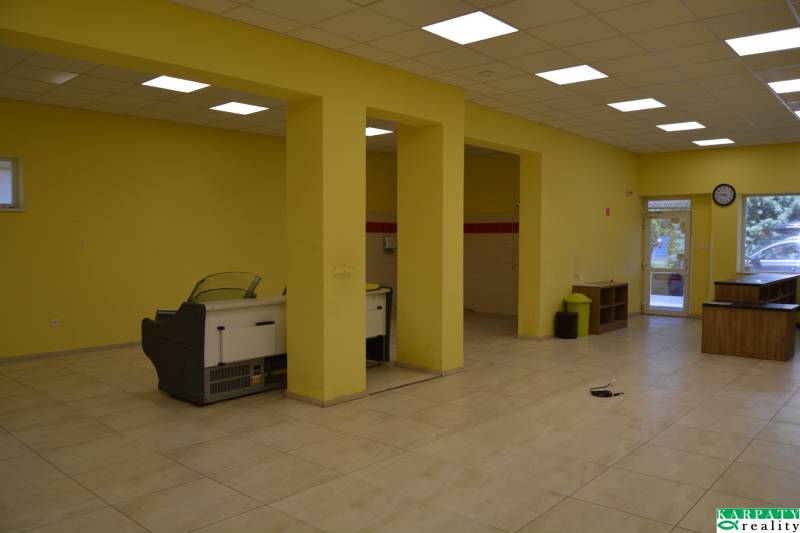 Commercial spaces with yellow walls and furnishings.