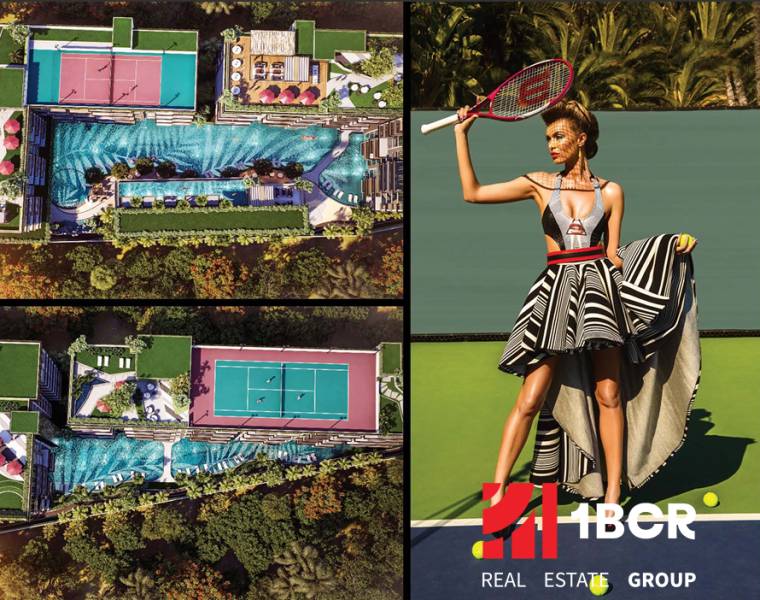 Apartment construction in Pattaya with a swimming pool, tennis courts, and an elegant residential environment.
