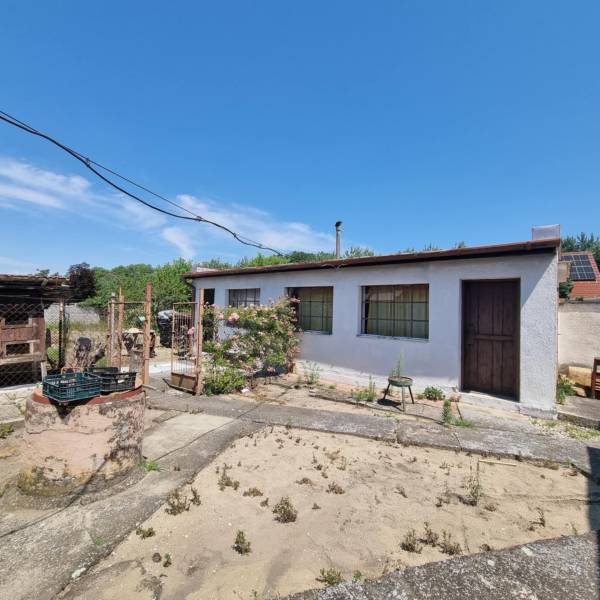 Family house on Riadok Street in Malacky with a yard and garden, next to a well.