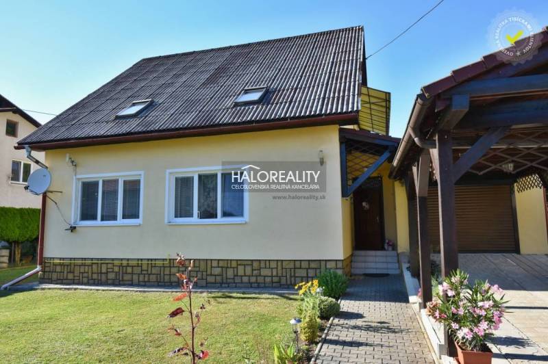 Yellow family house in Župkov with a terrace and garden, parking space.