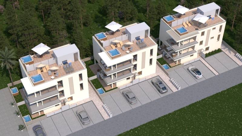 3 modern apartment buildings with terraces, jacuzzis, and parking, surrounded by greenery.