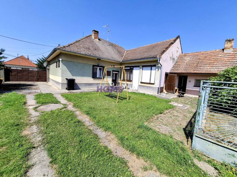 A family house surrounded by a garden on Čierna Voda street in Čierna Voda, residential plots.