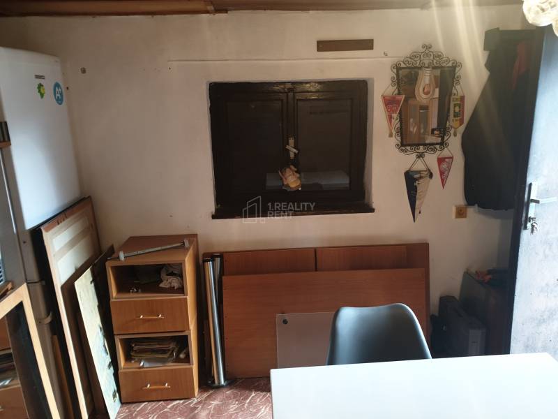 Interior of a cabin with furniture and decorations, simple space.