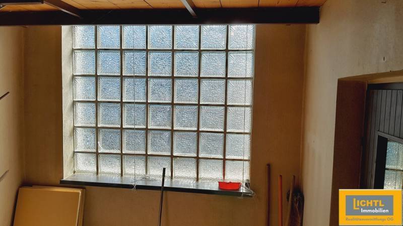 Glass wall with shelf, an element of the Housing Construction project.