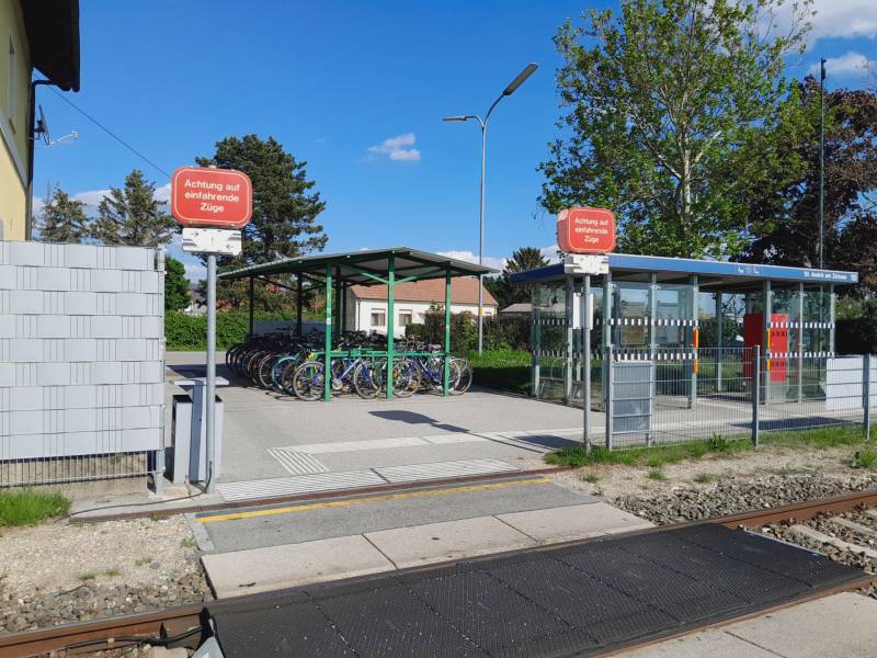 Train station with a bicycle shelter in St. Andrä am Zicksee.
