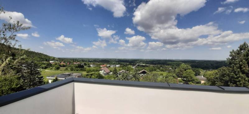The view from the villa in Hainburg an der Donau over the vast landscape and sky.
